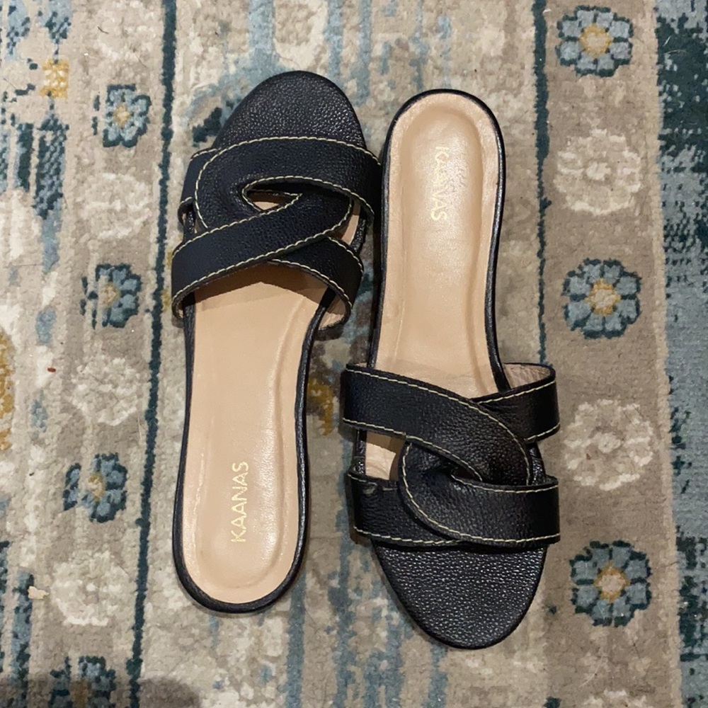 Kaanas black twisted slides / sandals